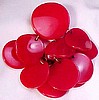 BP99 red bakelite disc charm pin